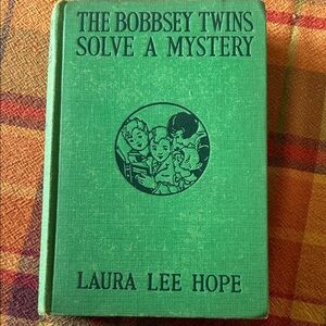 Green Hardcover Book - The Bobbsey Twins Solve a Mystery by Laura Lee Hope